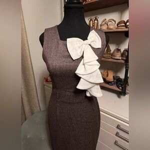 Elegant Brown Dress with White Bow Accent